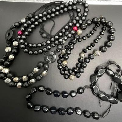 4 Black necklaces and 1 black bracelet