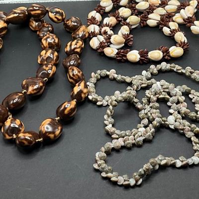 Sea snail shell necklace, Marble Brown Kukui Nut Hawaiian Lei Necklace, Apple seed and cowrie Necklace
