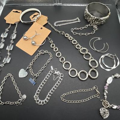 Silver bracelets and earrings