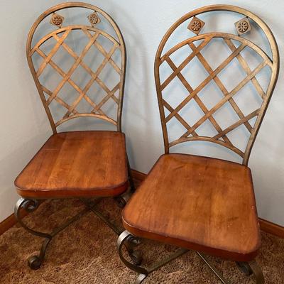 2 solid metal back chairs