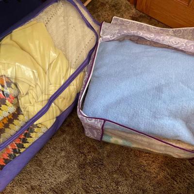 Purple storage holders with 9 blankets