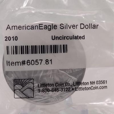 2010 Amercian Eagle Silver Dollar Uncirculated in Littleton Co. Sealed Packet (#101)