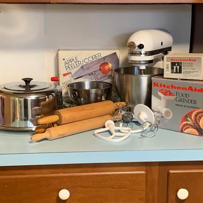 LOT 57K: Kitchen Aid Mixer w/Beaters, Food Grinder & Sausage Stuffer, Apple Peeler/Corer, Rolling Pins, Metal Bowls and a Vintage Covered...