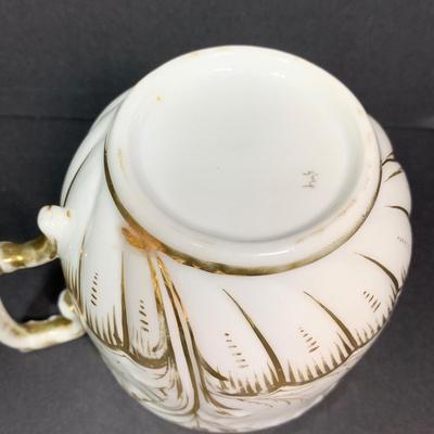 LOT 59K: Limoges Hot Chocolate Pot, Ardalt Occupied Japan Fallen Skater, Royal Worcester Porcelain Egg Coddlers & More