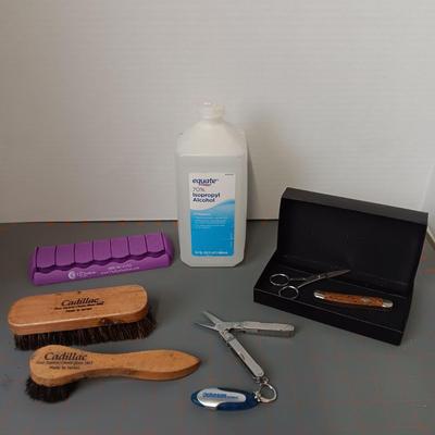 Shoe Brushes, Pocket Knife, Scissors, Pocket Multi-Tool, Pill Case, and Rubbing Alcohol