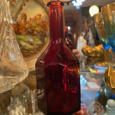 Cranberry glass geometric shaped bottle