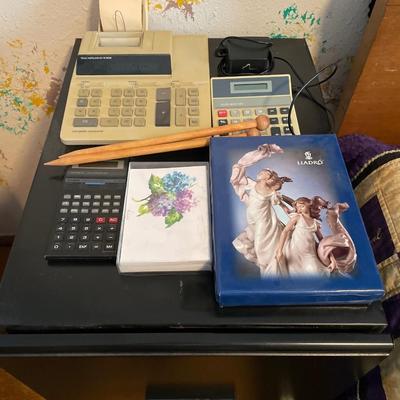 Cards, 3 calculators and filing cabinet