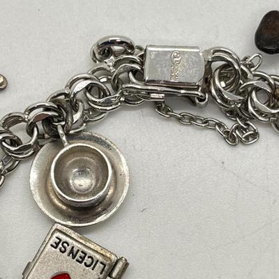 Lot 337J: American Sterling Vintage Charm Bracelet