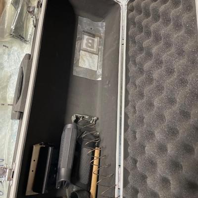 Gun parts and black case