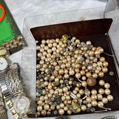 Watches, jewelry, boxes, loose beads