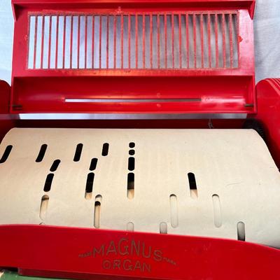 Toy player piano organ with music rolls