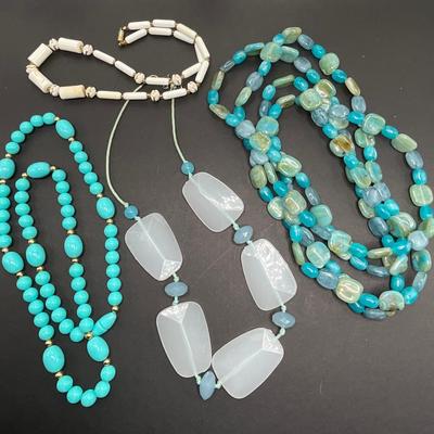 Blue and white necklaces, mix of glass beads