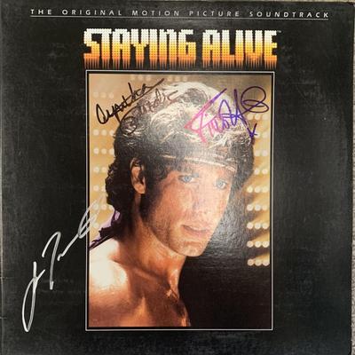 Staying Alive cast signed sound track. GFA Authent