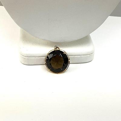 1065 10k Large Round Brown Quartz Pendant