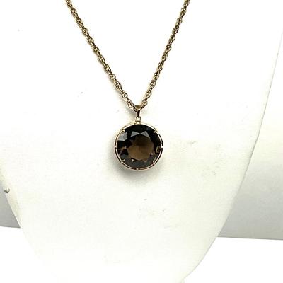 1065 10k Large Round Brown Quartz Pendant