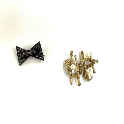 1075 Art Deco Celluloid Rhinestone Brooch and E. Pearl Snake / Pearl Brooch