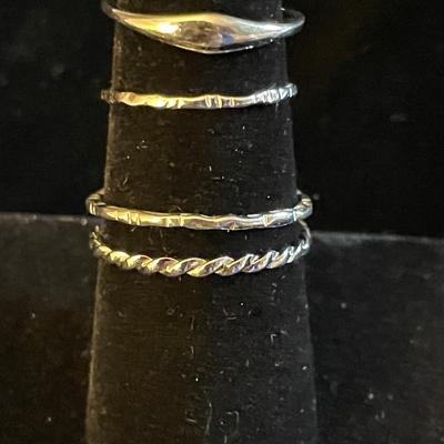 FOUR STERLING SILVER BANDS