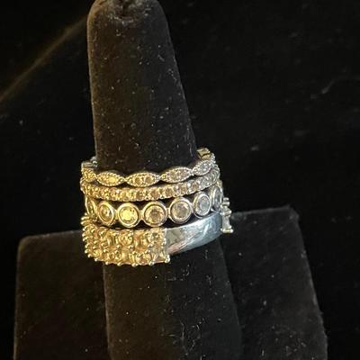 FOUR STERLING SILVER BANDS
