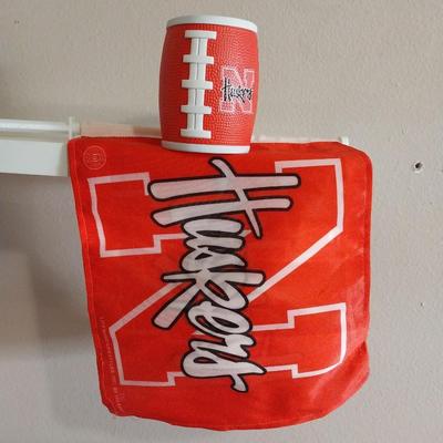 AUTOGRAPHED HUSKERS FOLDING CHAIR, WINDOW FLAG AND KOOZIE