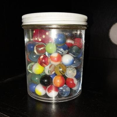 JAR OF MARBLES WITH SOME DICE TOO
