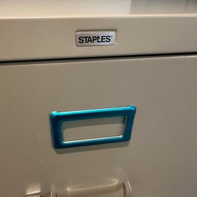 Lot 687 Staples 4 drawer file cabinet