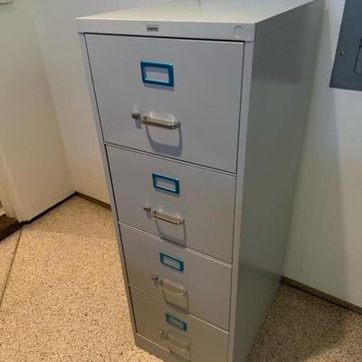Lot 687 Staples 4 drawer file cabinet
