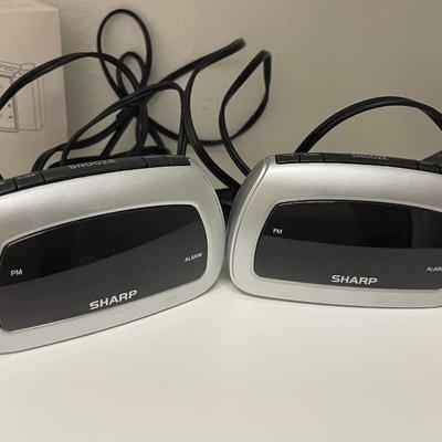 Two Sharp Model SPC085 Alarm Clocks
