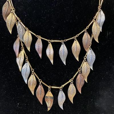 Gold and silver tone leaf necklace and clip ons