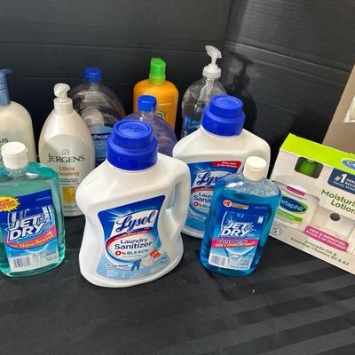 Lot 716 variety of laundry items and shampoos