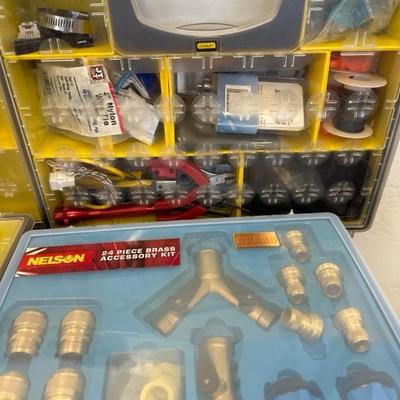 Lot 764, organizing boxes, brass lawn hardware and bungee system