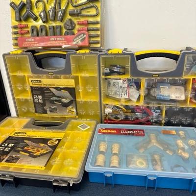 Lot 764, organizing boxes, brass lawn hardware and bungee system