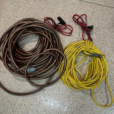 Lot 777 garden hose and three extension cords