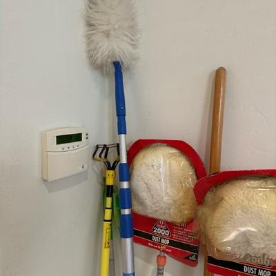 Lot 806 variety of brooms and dusters