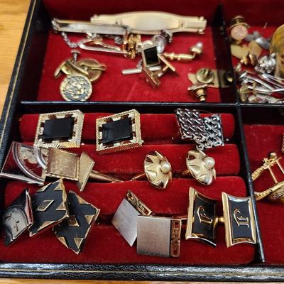 Box of men's jewelry