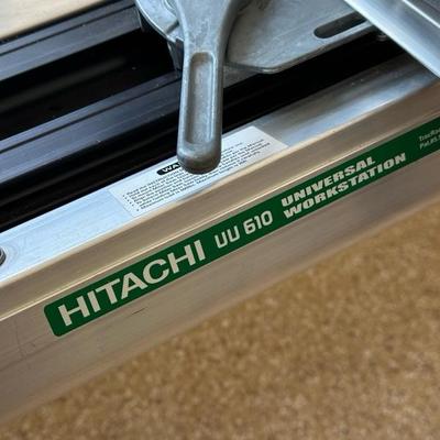 Lot 813 Dewalt 12 inch compound miter saw model DW708 mounted on Hitachi, universal workstation
