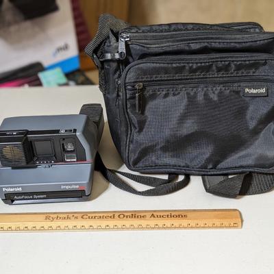 The Polaroid 600 Impulse AF (autofocus) Analogue Instant Camera