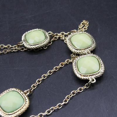 Necklace with Green Faceted Stones set in silver tone