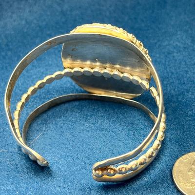LARGE UNMARKED SILVER PAWN STYLE CUFF BRACELET WITH PURPLE, GREY POLISHED STONE