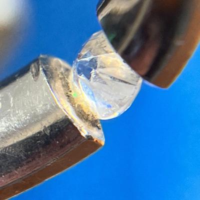 STERLING BAND WITH DIAMOND OR CZ? "FLOATING" STONE