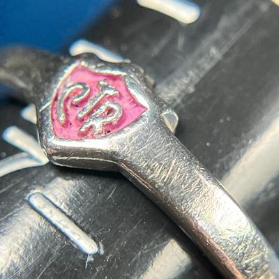 STERLING "CTR" RING WITH PINK BACKGROUND