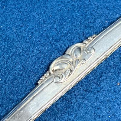 FANCY STERLING COMB SPINE