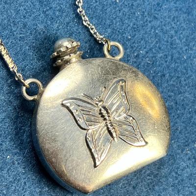 STERLING VIAL PENDANT NECKLACE WITH BUTTERFLY MOTIF AND SCREW TOP LID