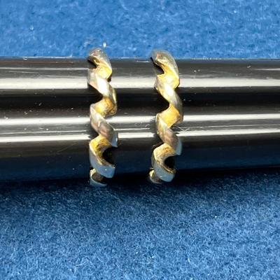 PAIR OF STERLING COIL RINGS