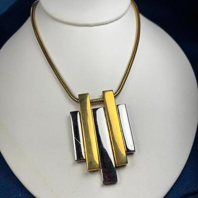 CONTEMPORARY GOLD-, SILVER-TONE STATEMENT PENDANT NECKLACE by AVON