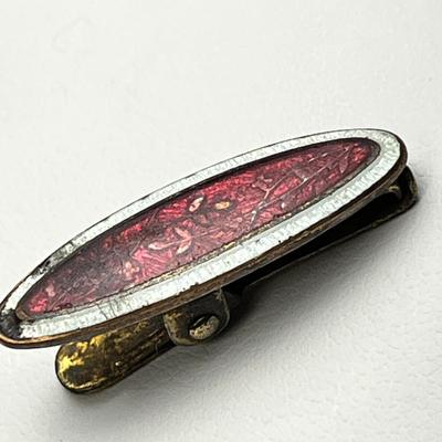 ANTIQUE ENAMELED CLIP FOR NAPKIN? 