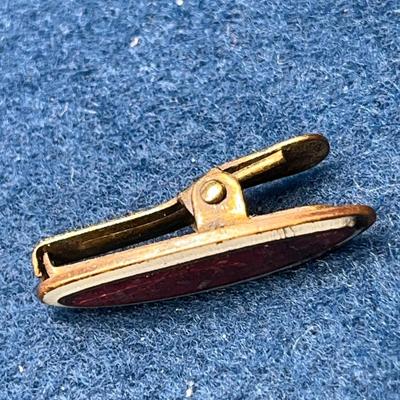 ANTIQUE ENAMELED CLIP FOR NAPKIN? 