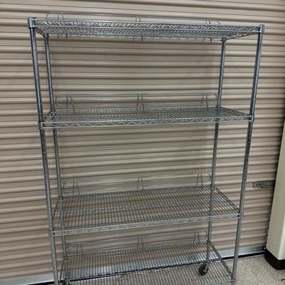 Lot 835 Rolling wire storage rock 77 inches tall 48 inches across