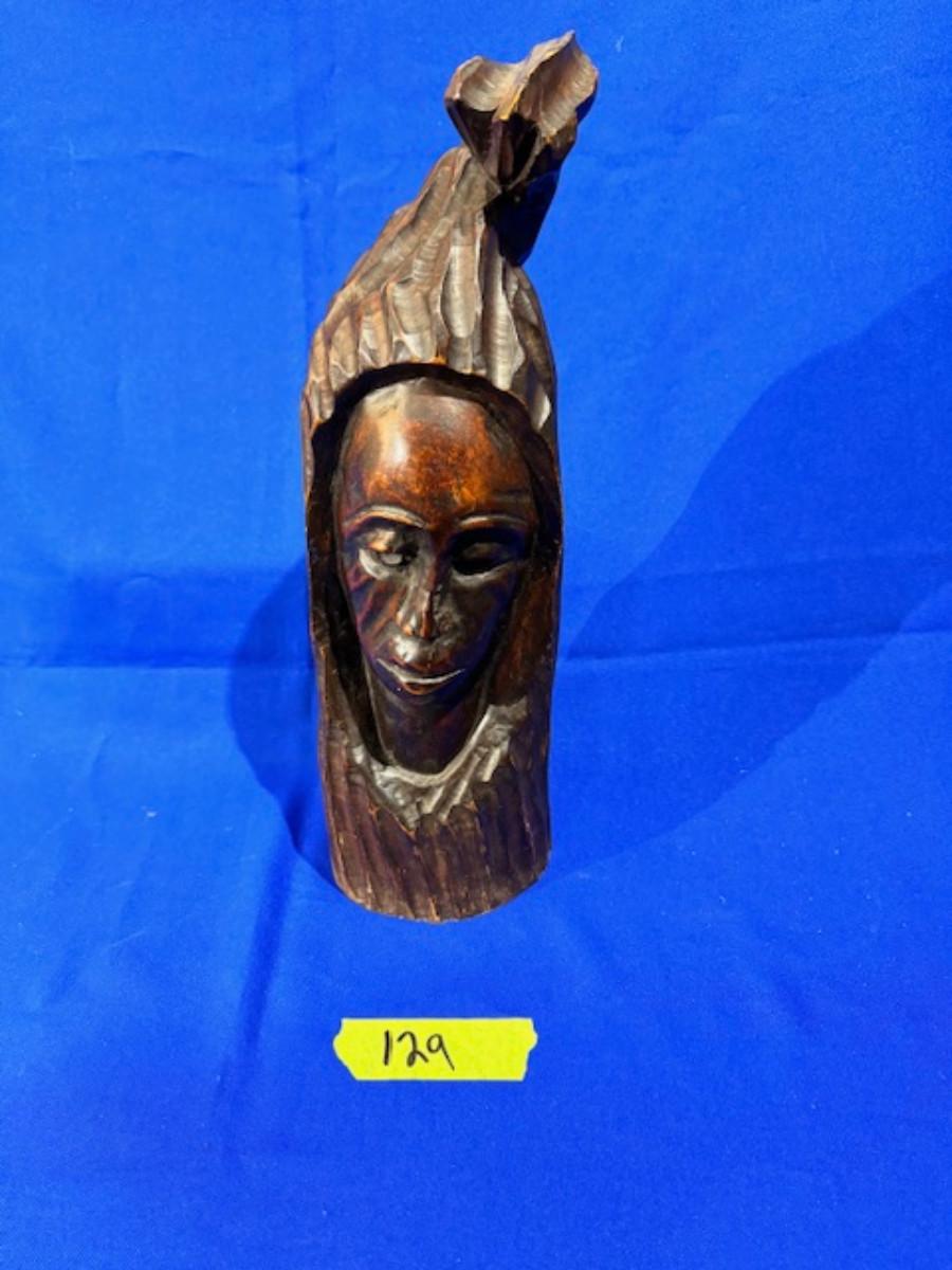 Hand carved wooden head