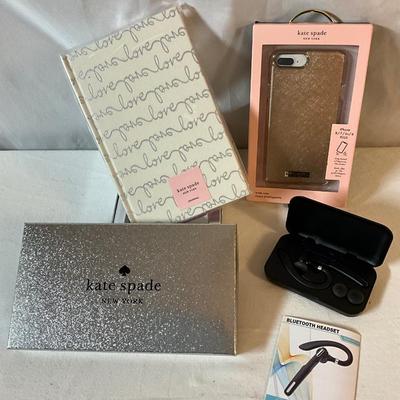 Kate Spade iPhone case, Journal, and a Bluetooth Headset