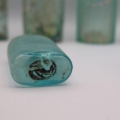 Variety of Antique Glass Bottles